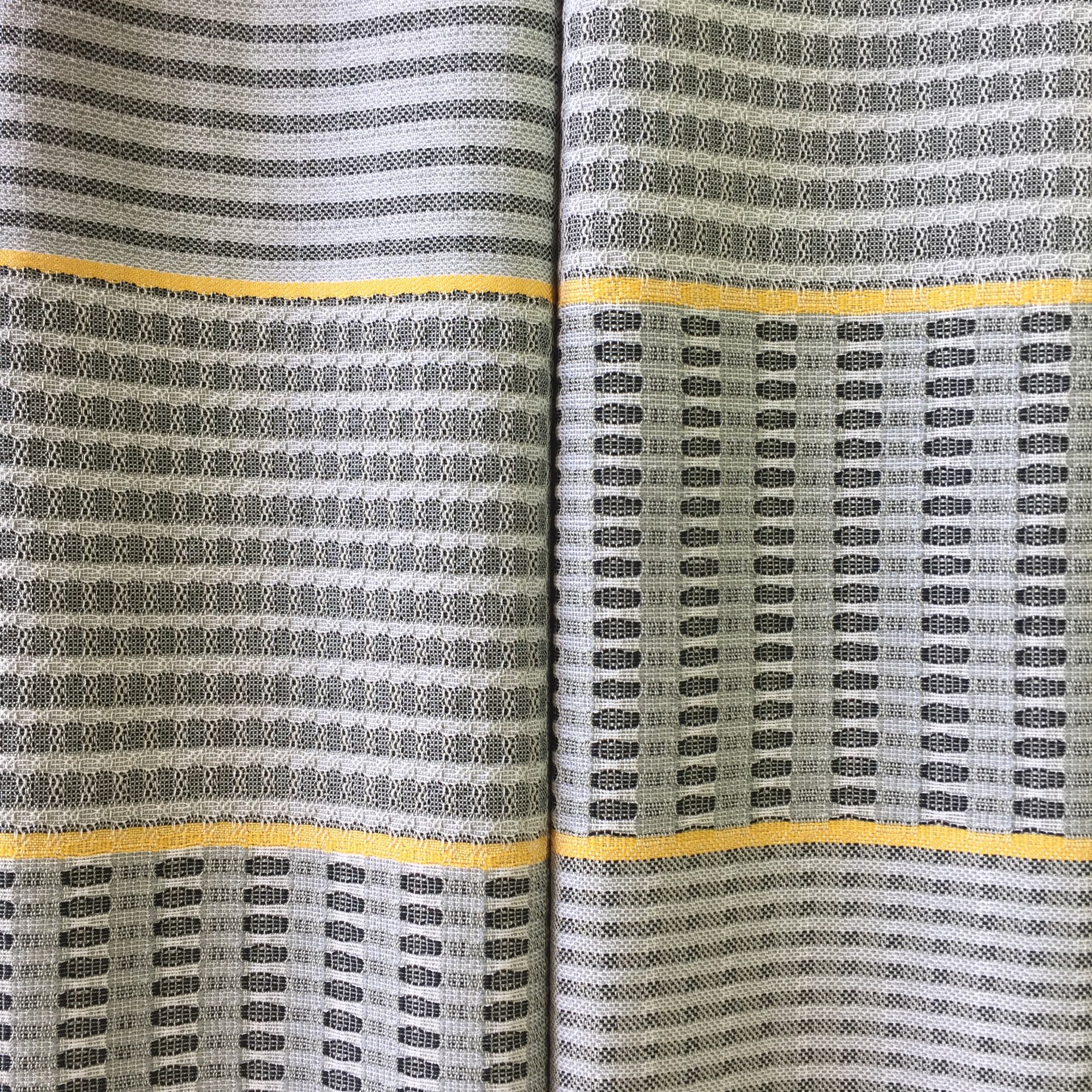 black and yellow towels